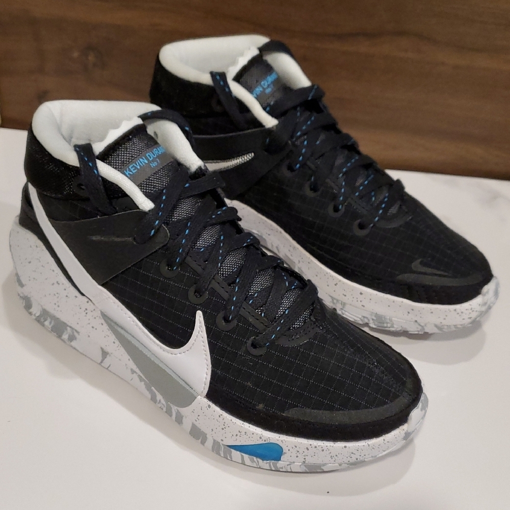 Nike Kids Sneakers in Black and White with Blue Accents